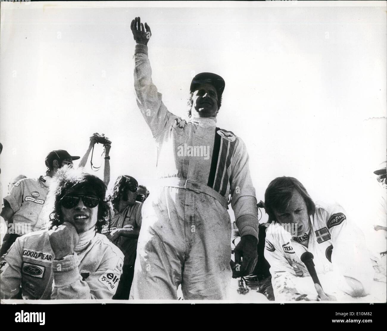 Jun. 06, 1973 - Denny Hume of New Zealand wins the Swedish Grand Prix. Denny Hume, the New Zealand racing driver driving a McLaren wont the Swedish Gran Prix in Anderstorp Sweden on Sunday. Photo Shows: After the race Denny Hume seen raising his hand after winning the Swedish Grand Prix. left is Francois Cevert, who was third, and right, Ronnie Peterson second. AM/Keystone Stock Photo