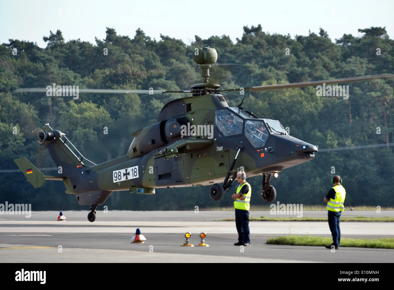 A helicopter of the model 'Eurocopter Tiger' lands on the fairground of the Berlin Air Show (ILA) held at airport Schoenefeld in Berlin, Germany, 11 September 2012. Photo: Robert Schlesinger/picture alliance Stock Photo