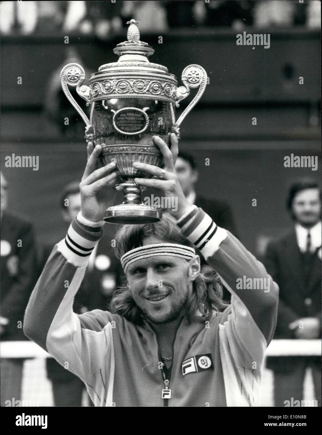 Jul. 07, 1973 - Bjorn Borg Wins The Wimbledon Title For The Third Time Running To Equal Fred Perry's Record; Today on the centre court at Wimbledon Bjorn Borg won the men's singles title by beating Jimmy Conlor 6-2 6-2 6-2. This makes it three on a row for Borg making him only the second player in the history of the game to do this, the other is the famous Fred Perry. Photo Shows Bjorn Borg holds up trophy on the centre court at Wimbledon this afternoon after beating Jimmy Connors 6-2 6-2 6-3. Stock Photo