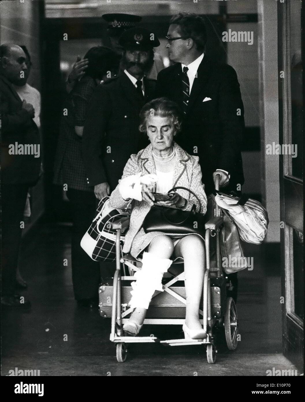 Sep. 09, 1973 - Bomb Explosion At Euston Station.  Photo Shows:- A woman pictured in a wheelchair with her leg and arm i Stock Photo