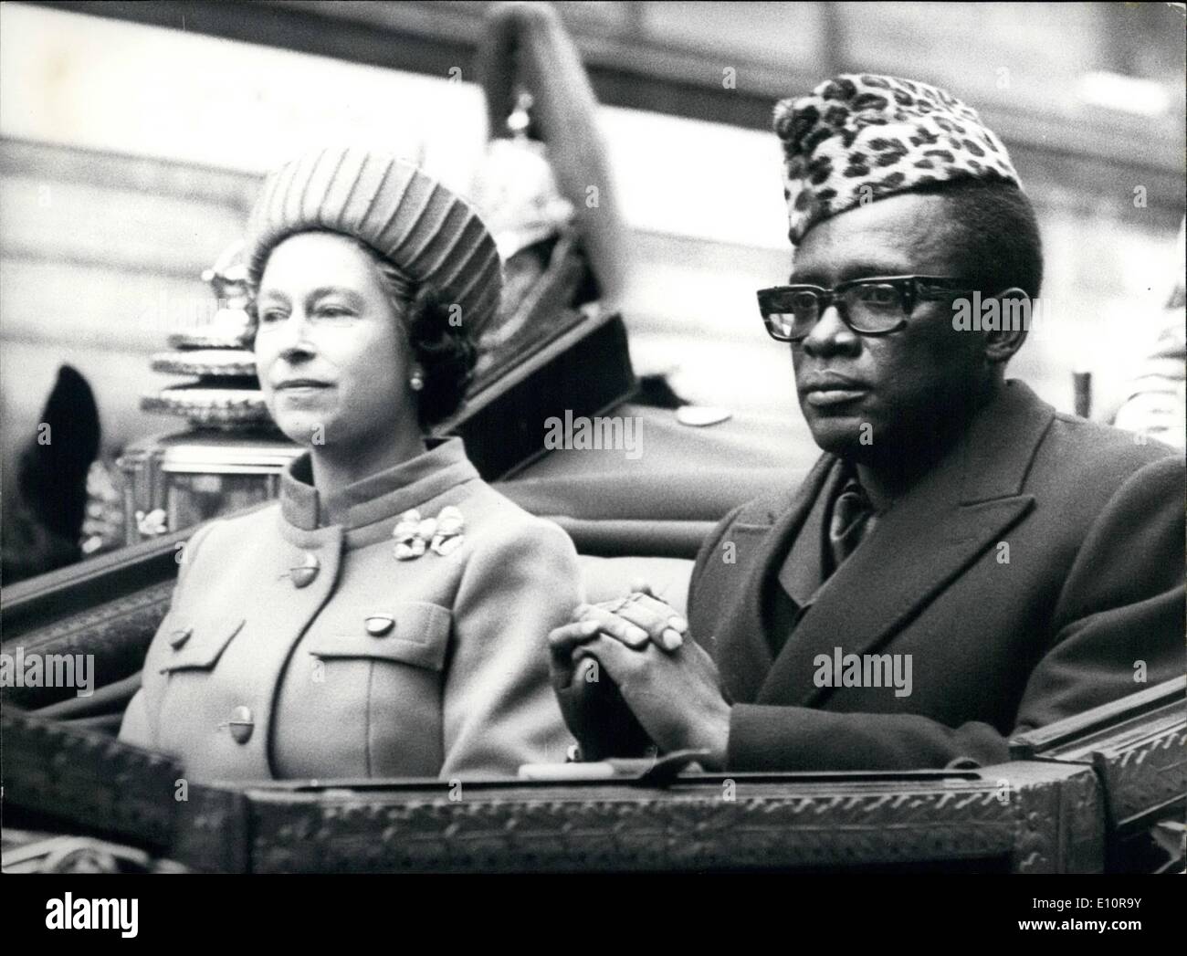 Dec. 12, 1973 - President Mobutu Arrives On State Visit: President Mbutu of Zaire and Madame Mobutu arrived in London today as a State Visit. Photo shows: H.M. The Queen driving with president Mobutu on the way to Buckingham palace, after the President's arrival at Victoria Station. Stock Photo