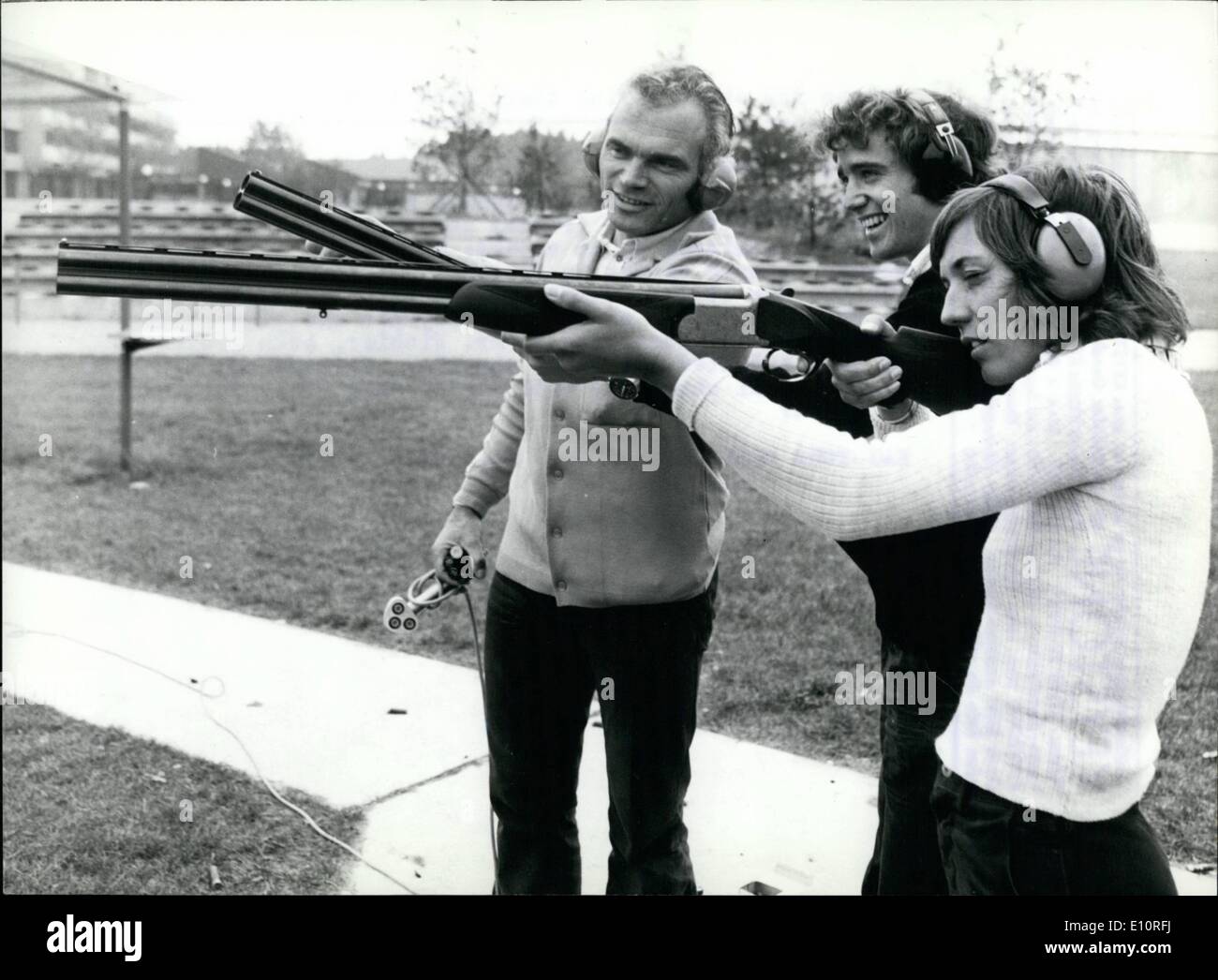 Oct. 10, 1973 - German top skier trying their luck in skeet shooting Aiming at new goals...are the two member&deg; of the German national skiing team Miss Rosi Mittermaier (right) and Mr. Christian Neureuth, (centre) assisted by an expert: Mr. German olympic winner in skeet. The two top winter athletes made their first experience in this discipline at Munich's Olympic shooting range just recently. According to Mr. dinkier, both proved to be very talented for skeet shooting. Perhaps one of these days the ski champions will switch completely from skiing to skeet? Stock Photo