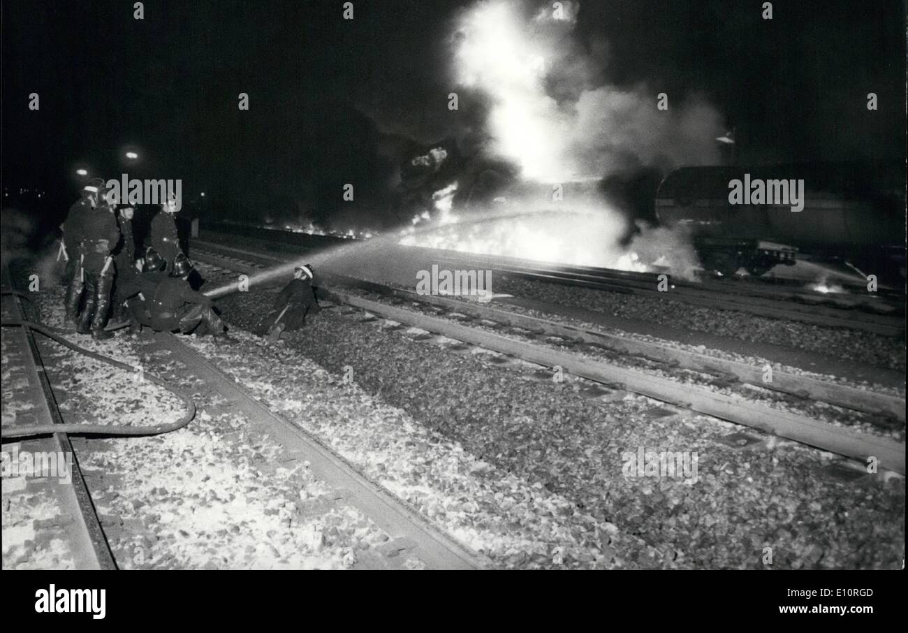 Oct. 10, 1973 - Langley oil depot blaze : From about 5 0clock last night until about 2.a.m this morning 680 tons of high grade petrol and 370 tons of diesel fuel in 13 rail tanker blazed away. At the height of the blaze the flame threatened to spread an lgnits more than million tons of fuel in six gastroenteritis tanks this massive all night fuel free was at the small town of Langley, bucks. In the total oil company's biggest fuel depotain Britain and supplies heath row airport and all southern England with petrol and oils Stock Photo