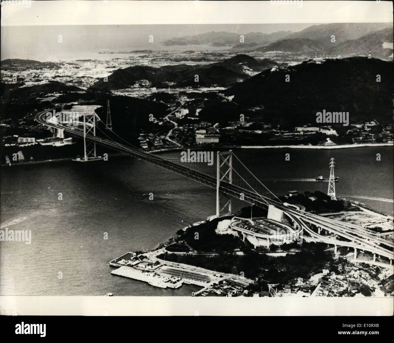 Jan. 01, 1974 - Largest Bridge, the longest span in the Orient, which connects Japan's Honshu mainland and Kyusu Island Island is now completed; The bridge, 1,068 meters long, 26 meters Long, 26 meters wide with six traffic lanes is 141 meters high. It is also the 10th longest suspension bridge in the world. Photo Shows View of the Kanmon Bridge, Japan, which has just been completed. Stock Photo