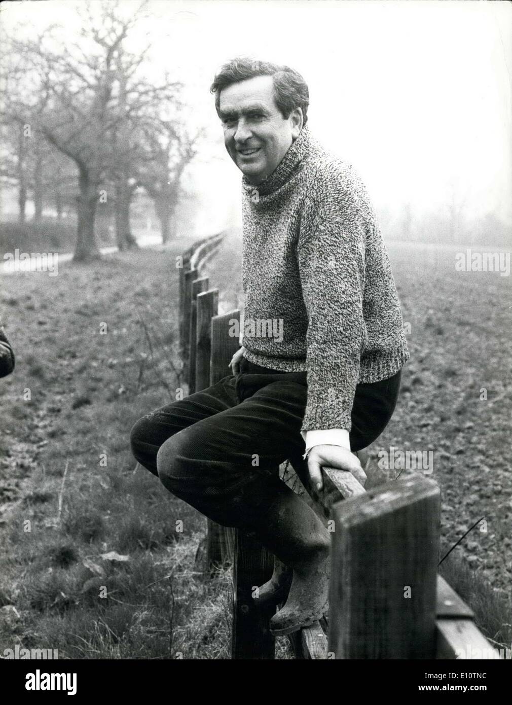 Mar. 23, 1974 - Denis Haeley the Chancellor Faces the Press at his Sussex Home.: Mr. Denis Healey the Chancellor of the Exchequer is spending a quite weekend at his sussex home before presenting his first buget next tuesday March 26th, with his wife Edna and Daughter Cressida aged 19. Photo shows Mr Haeley takes arest during his stroll near his home in Sussex this morning. Stock Photo