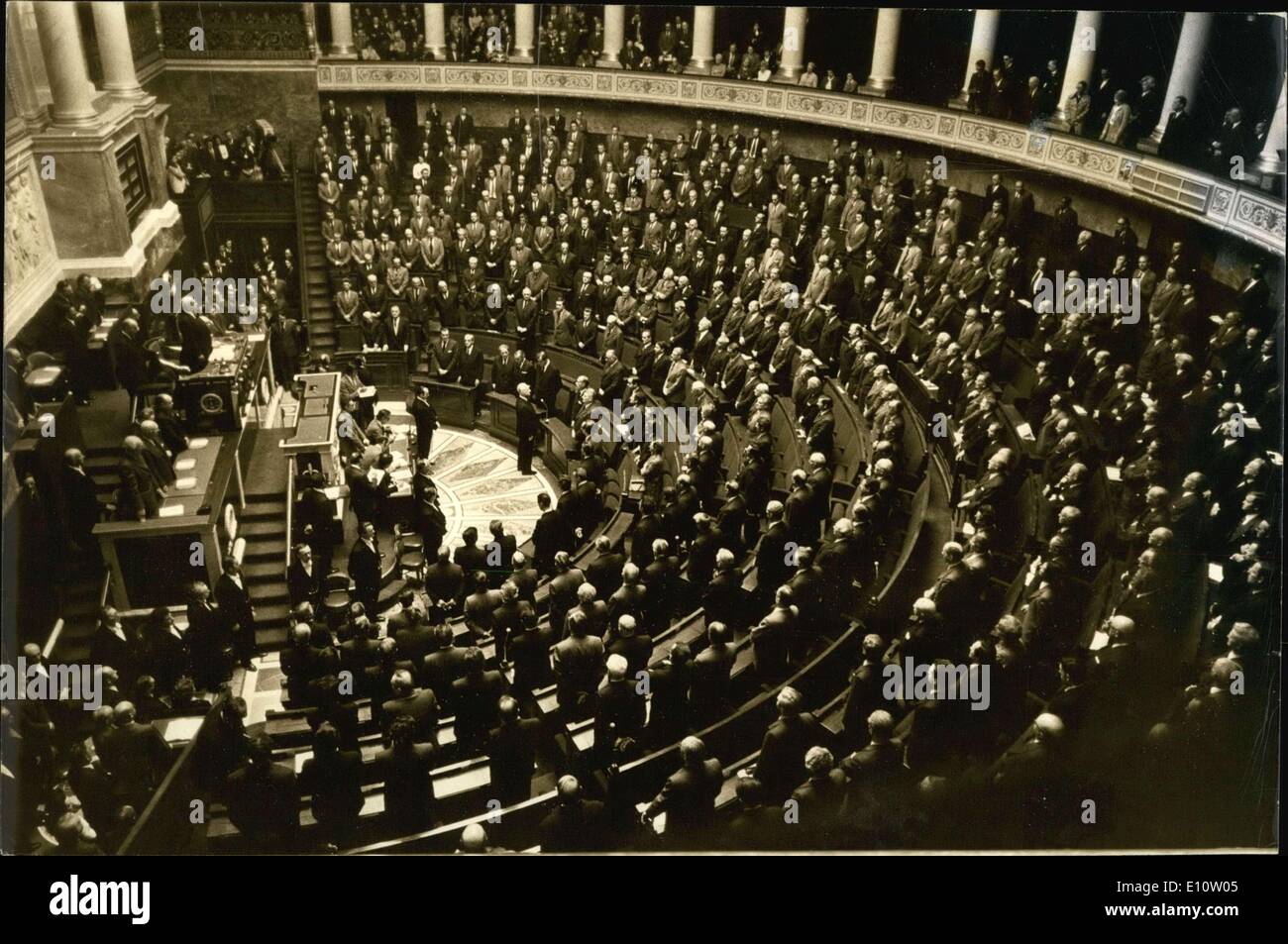 Apr. 04, 1974 - The National Assembly paid their respects to President Georges Pompidou this afternoon. President of the Assembly Edgar Faure and the Prime Minister both gave a speech. The representatives are standing. President Edgar Faure on the ''perch'' and Pierre Messmer are facing them. Stock Photo