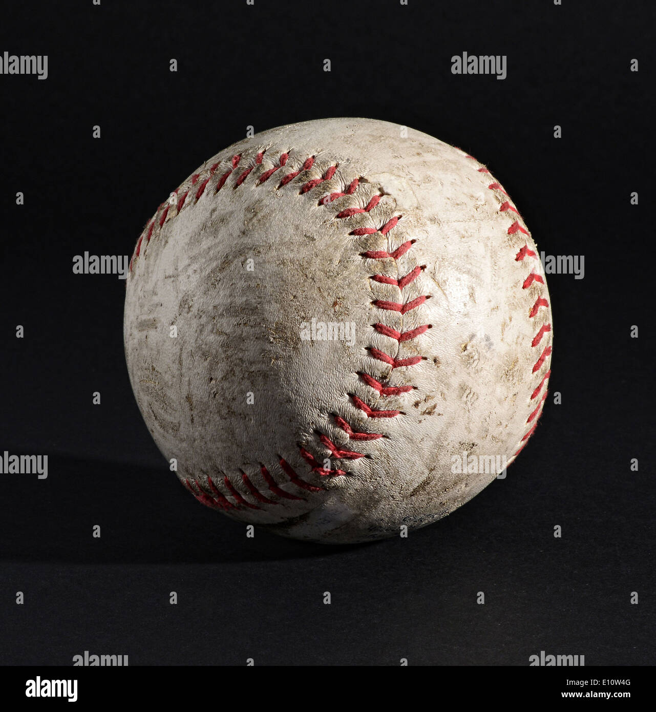 Old leather baseball on black background Stock Photo