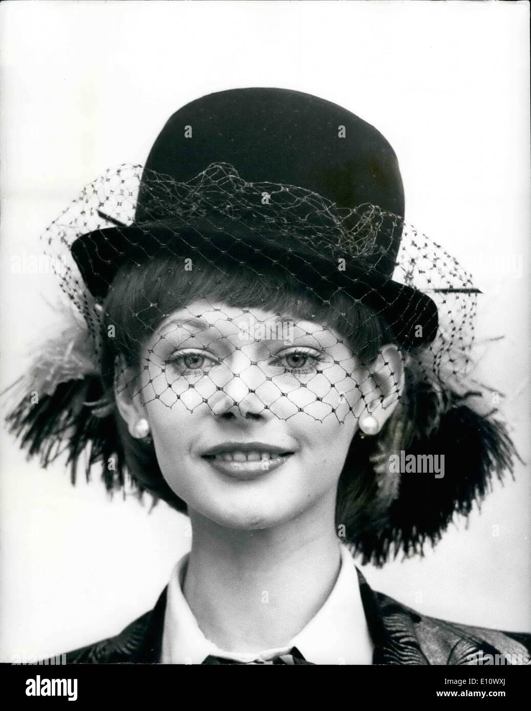 May 05, 1974 - Autumn Millinery Show: A Collection of Autumn millinery was shown in London today by The Millinery Guild. Photo Shows Model Clover wears a bowler in black velvet, with eye veil, and Ostrich trimming - by Norman Edwin. Stock Photo