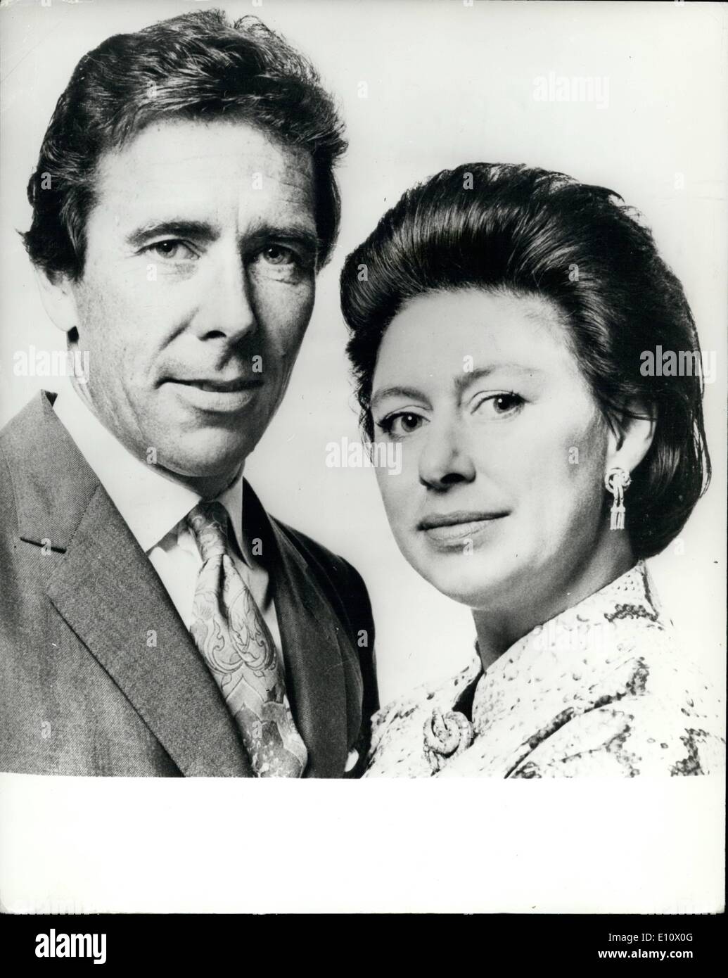 May 05, 1974 - H.R.H. Princess Margaret and Lord Snowdown.: An informal portrait of Princess Margaret and Lord Snowdon, taken at Kensington Palace. The Princess is wearing a snake-skin prnt caftan' matching brooch and earrings. Princess Margaret and the Earl of Snowdown are visiting the United States and Canada from May 2 to May 14. Stock Photo