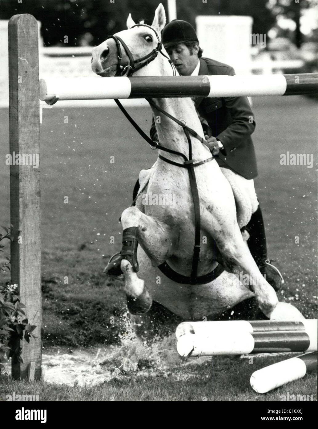 Jul. 17, 1974 - MEN'S WORLD HORSE JUMPING CHAMPIONSHIP AT HICKSTEAD SCHOCKEMOHLE OF WEST GERMANY FALLS: The first round of the Men's World Horse Jumping Championships started today at Hickstead, Sussex. Photo shows Alwin Schockemohle of West Germany comes off when his horse Rex the Robber refused to take the Water Ditch. Stock Photo