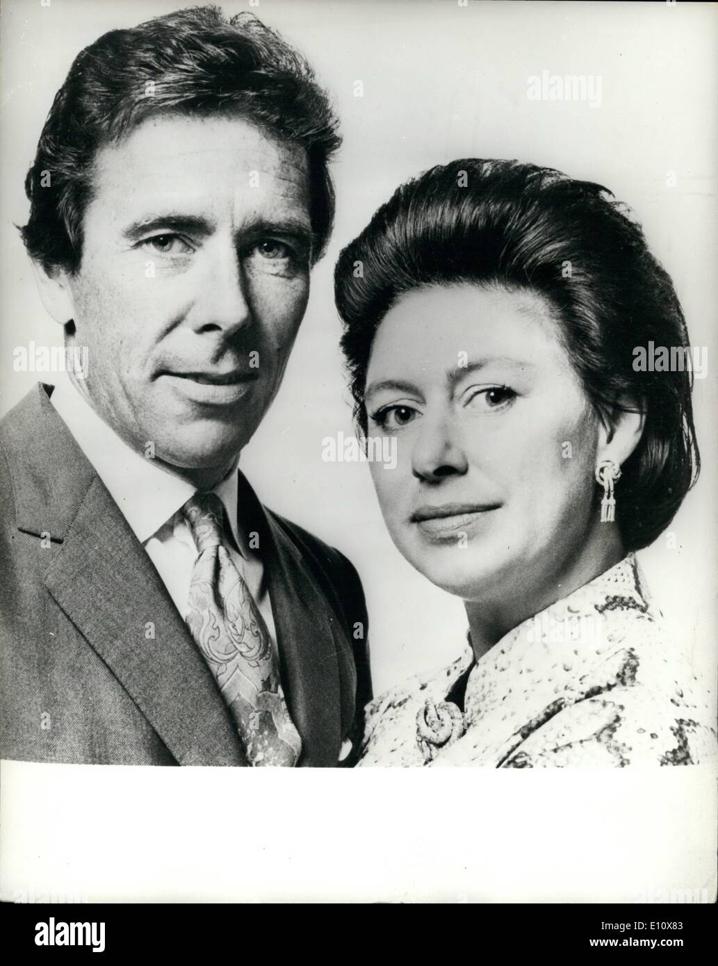 May 05, 1974 - H.R.H. Princess Margaret And Lord Snowdon: An informal portrait of Princess Margaret and Lord Snowdon, taken at Kensington Palace. The Princess is wearing a snake-skin print caftan; matching brooch and earrings. Princess Margaret and the Earl of Snowdon are visiting the United States and Canada form May 2 to May 14. Stock Photo