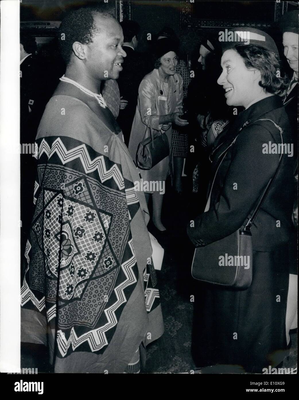 May 17, 1974 - Princess Margaret at Annual General Meeting of Girl Guides Association. Princess Margaret, in her capacity of President of the Girls Guides Association, chats to colourfully clad Mr. R.M. Shabalala, First Secretary, Office of the High Commissioner for the Kingdom of Swaziland, after she presided at this afternoon's annual general meeting of the Association, at St. James Palace. Mr. Shabalala was on hand to escourt Swaziland Prime Minister's wife, Lady Diamini, President of the Swaziland Girl Guides Association, who also attended the meeting. Stock Photo