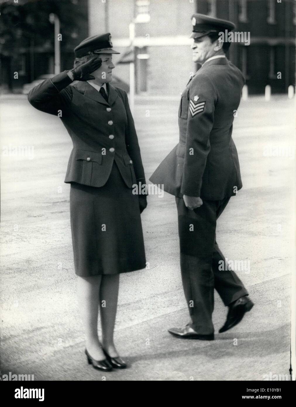 Oct. 10, 1974 - A Salute From Dad: The father of four girls, Flight Sergeant Bill Peden will have to call his eldest daughter ''Mam'' following today's ceremony - by order of the Royal Air Force. Carol Anne, 19, graduated after a parade at the R.A.F. Training Command Officer Cadet Unit at Henlow as a WRAF Pilot Officer. She received her very first respectful salute from her own dad. Carol Anne joined the Women's Royal Air Force on April 21 this year shortly after her family came home from a tour of duty in Cyprus where her father was based at RAF Akrotiri Stock Photo