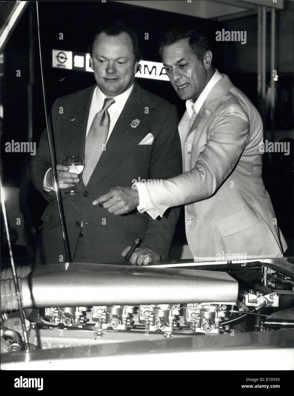 Oct. 15, 1974 - Motor Show Earls Court; Photo Shows Famous America actor Tony Curtis takes a lock at the Aston Marin with its Chairman S.W. Willson during his visit to the Motor show today. Stock Photo