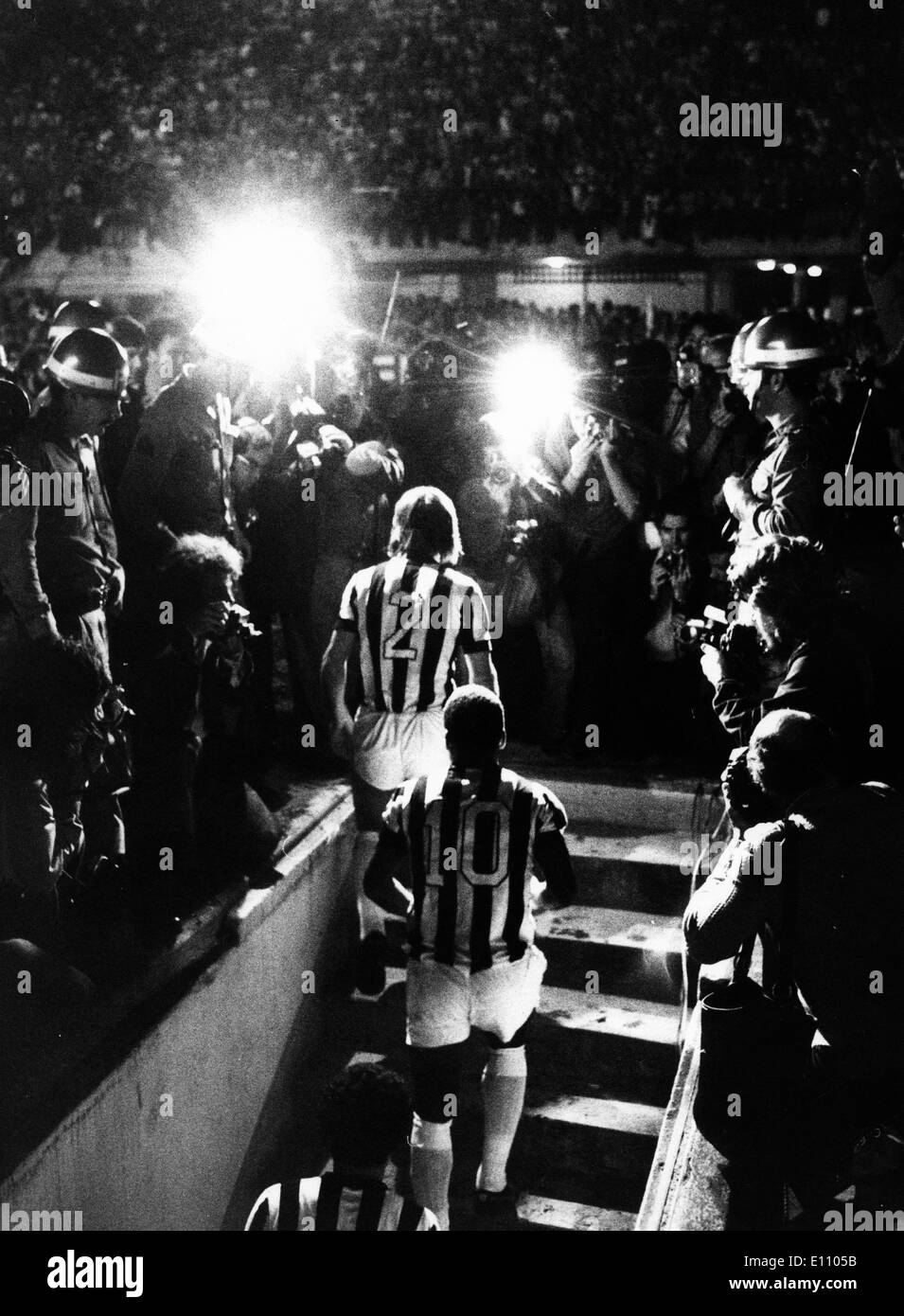 Footballer Pele enters field with teammates Stock Photo