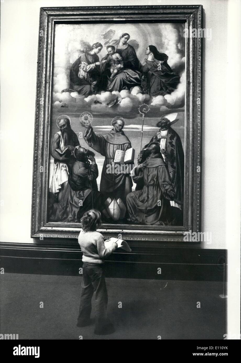 Dec. 12, 1974 - The Young critic: This youngster stands in rapt admiration of the painting St. Bernandine of Siena by Mortte (1498-1555) at the National Gallery London. Stock Photo