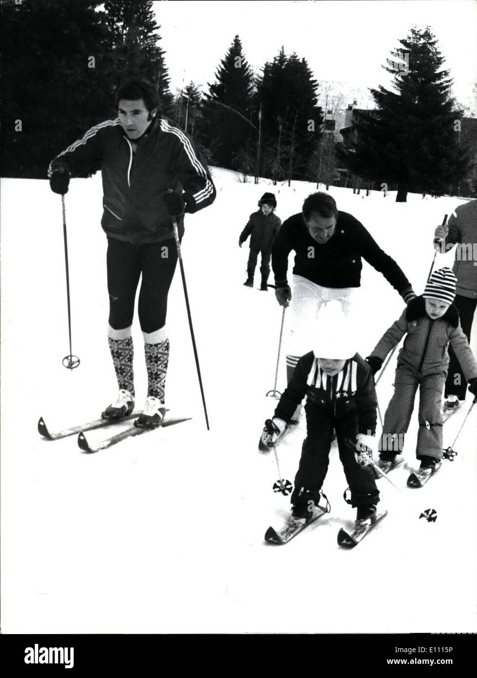 Dec. 12, 1974 - Eddy Merckx Skiing in Switzerland: Worldchampion Eddy Merckx actually spends his winter vacations in Crans sir Sierre in Switzerland where he goes out for skiing nearly every day, accompanied by his little daughter Sabrina (foreground right) and ski-coach Bobby Rombaldi. Stock Photo