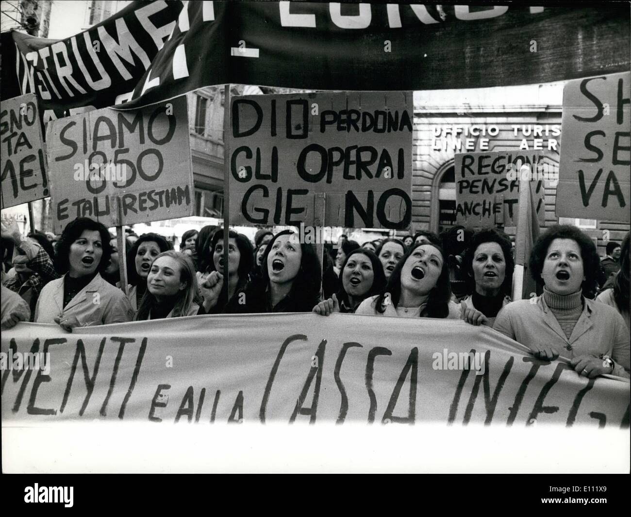 Jan. 01, 1975 - Rome, January 1975 - They seem to sing, but in effect they are demonstrating in front of the American Embassy in Rome protesting as an American Italian industry in Italy menace to close. Stock Photo