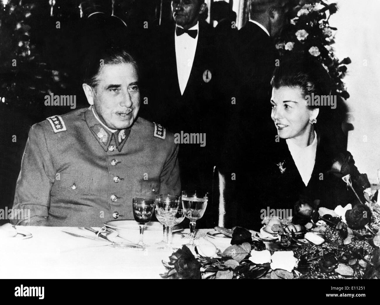 Augusto Pinochet dining with Isabel Martinez de Peron Stock Photo