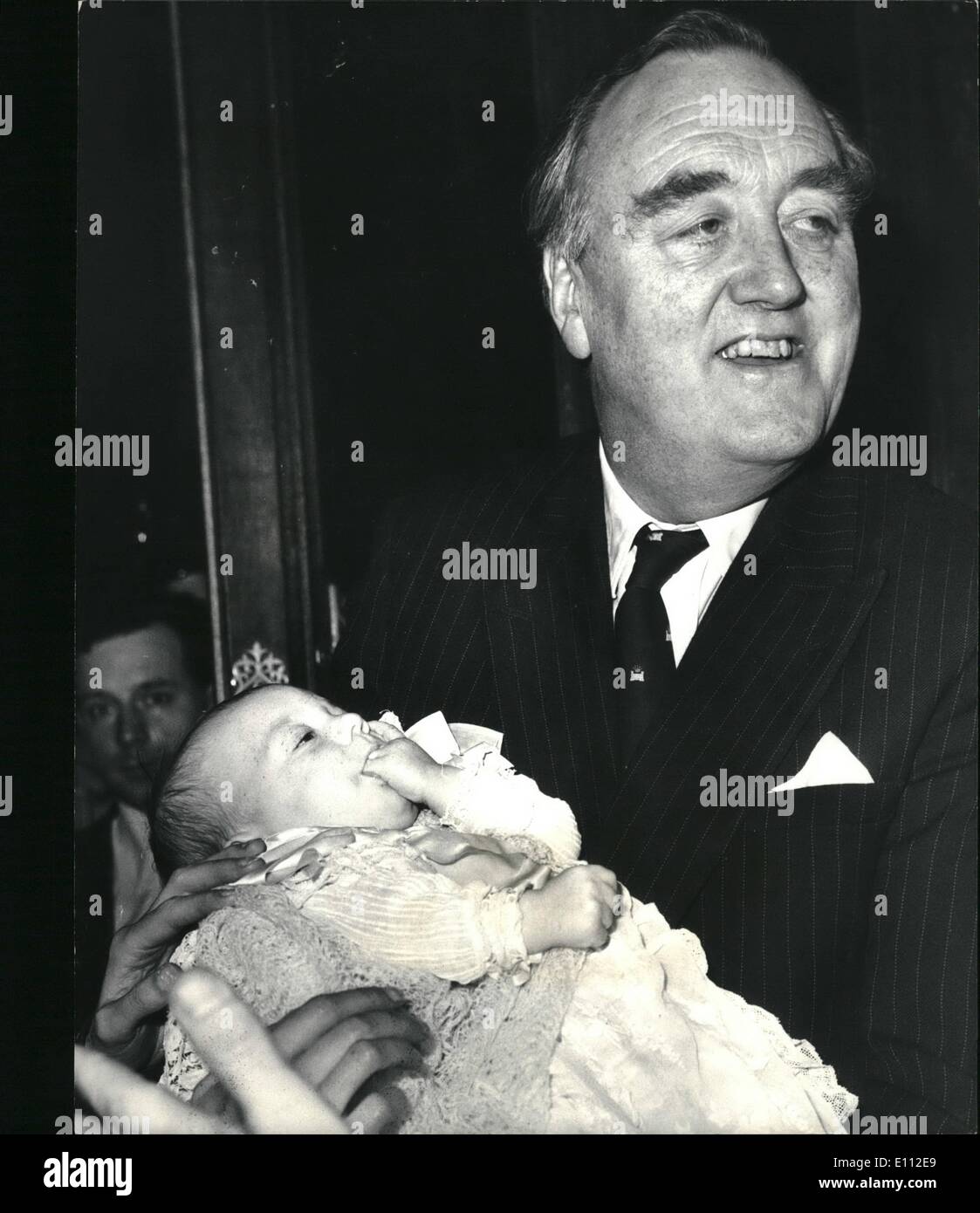 Feb. 02, 1975 - Willie Whitmen Holds The Baby: Mr. William Whitelaw today attended the Christening of is grand daughter, Miranda, the 5-month-old daughter of Mr. Whitelaw's daughter Carol and her husband Robert Thomas. The Christening took place at the Crypt Chapel in the House of Commons. Photo Shows Willie Holds the Baby Mr.Whitelaw is pictured with his baby granddaughter, Miranda, in his arms after the Christening today. Stock Photo