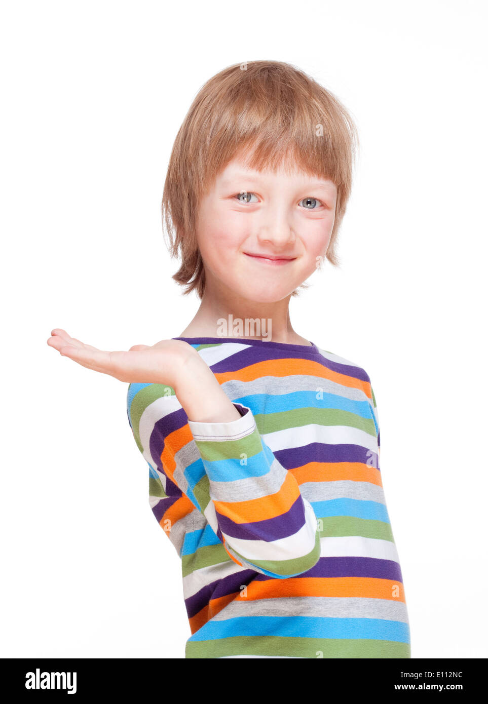 Boy Stretching out his Arm with Palm up, Looking, Smiling - Isolated on White Stock Photo