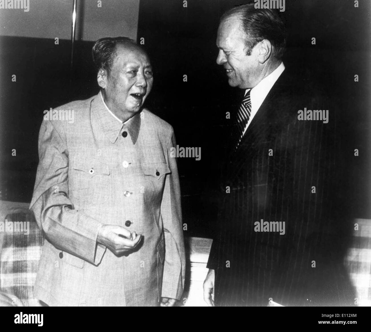 June 12, 1975 - Peking, China - During his official visit to Popular China, the American President GERALD FORD met the main Chinese leaders like the President MAO ZEDONG. PICTURED: Both leaders having a pleasant conversation. Stock Photo