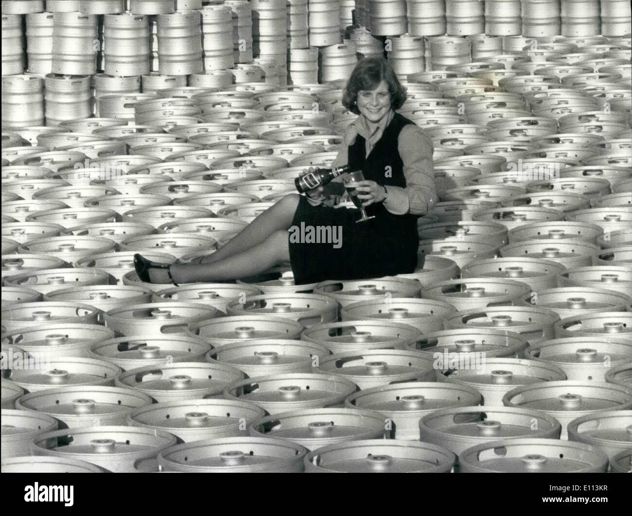 Oct. 10, 1975 - Pretty Jane's taste-budding profession is beer tasting but she hates the stuff: Jane Harland, 22, must be the envy of millions of beer drinkers throughout Britain, for her job is testing beer to make sure that the ale which eventually is sold in pubs is just right. But there is a snag-Jane hates the stuff - she drinks plenty of tea. Jane got the job because Bass Charrington, noticed heracute sense of taste when she used to complain if the tea tasted odd. she has to identify the odd one of three beer served in black glasses and give her comments Stock Photo