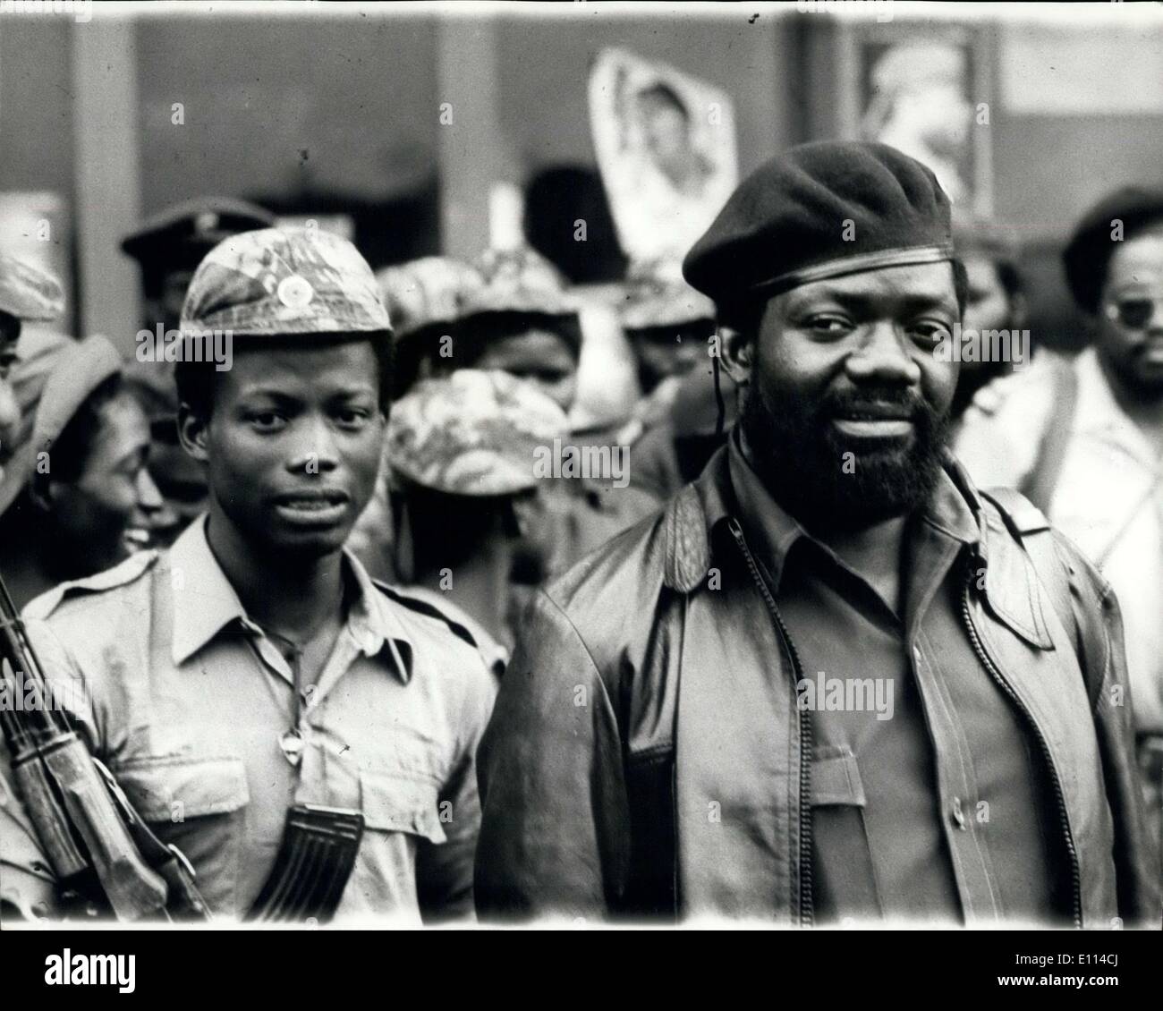 Nov. 07, 1975 - The Fighting Intensifies in Angola: The struggle for control of Angola intensifies as Independence Day, November 11th, approaches, despite reports from Kampala on Ugande radio of an agreement to form a tripartite government, In the South of the country the combined forces of UNITA and the F.N.L.A. continue to put intense military pressure on the M.P.L.A. Photo shows Dr. Jonas Savimbi,of UNITA and his Political Secretary, Ernesto Mufato, reading in intercepted M.P.L.A. message to evacuate Lobito. Stock Photo