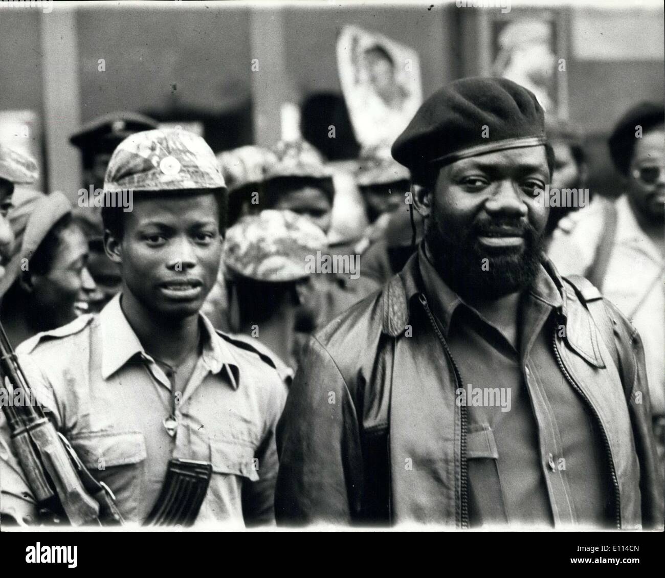 Nov. 07, 1975 - The Fighting Intensifies in Angola: The struggle for control of Angola intensifies as Independence Day, November 11th, approaches, despite reports from Kampala on Ugande radio of an agreement to form a tripartite government, In the South of the country the combined forces of UNITA and the F.N.L.A. continue to put intense military pressure on the M.P.L.A. Photo shows Dr. Jonas Savimbi,of UNITA and his Political Secretary, Ernesto Mufato, reading in intercepted M.P.L.A. message to evacuate Lobito. Stock Photo
