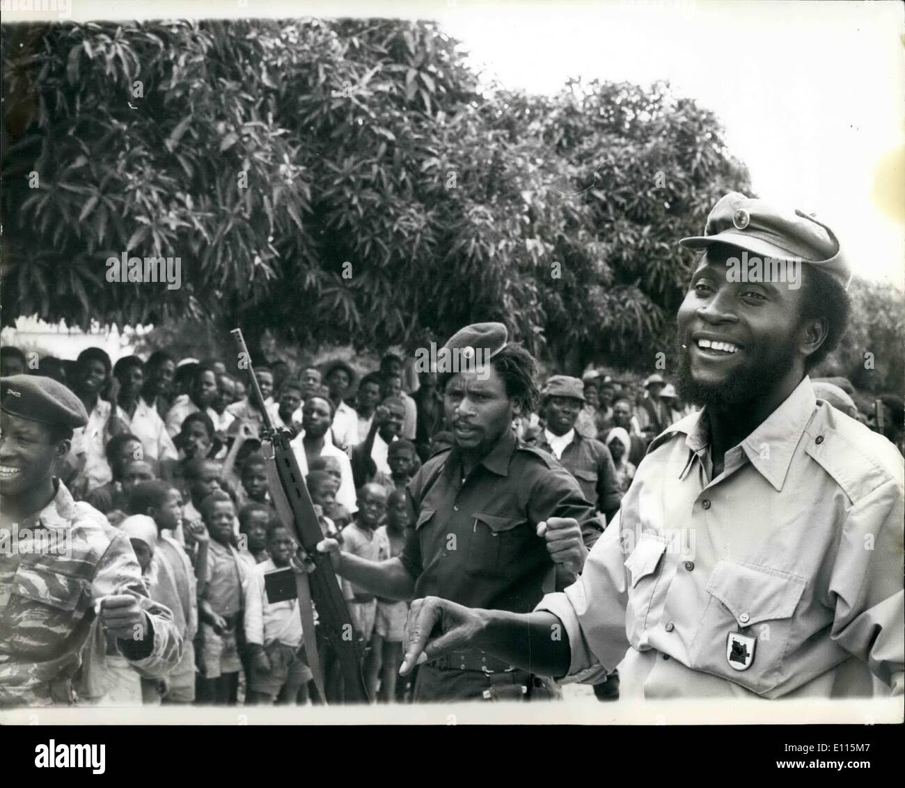 Jan. 01, 1976 - Unita's Defence Line Smashed: The Cuban-led M.P.L.A. Angelan forces claims the have smashed through UNITA defences and opened the 100 mile road south to endanger Unita's political Capital Huambo. Photo Shows: Colonel Samuel Chiwale. Commander-in-chief of the Armed Forces of Unita seen enjoying a joke with some of his troops near the front line. Stock Photo