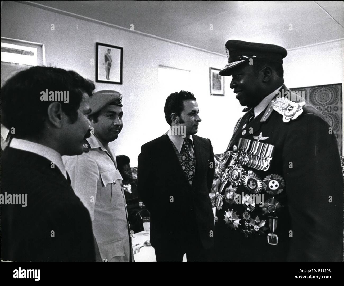 Jan. 01, 1976 - After the fly-pass President Amin is seen talking with top Libyan Military representatives at the celebrations. Stock Photo