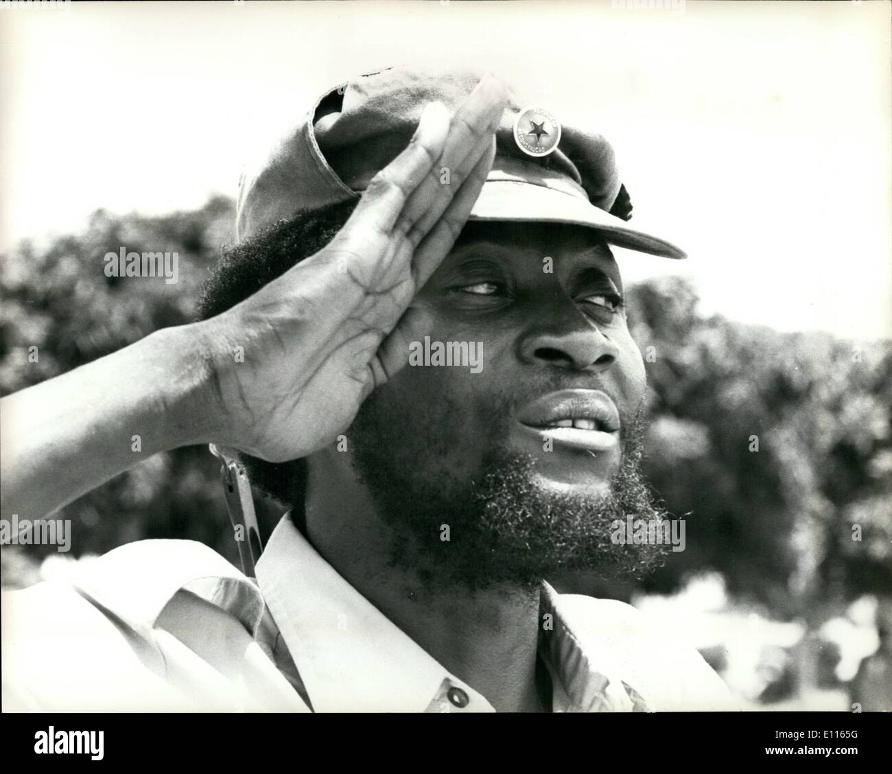 Jan. 01, 1976 - Unita's Defence Line Smashed: The Cuban-led M.P.L.A. Angelan forces claims the have smashed through Unita defences and opened the 100 mile read south to endanger Unita's political Capital Huambo.Photo shows Colonel Samuel Chiwale, Commander-in-chief of the Armed Forces of Unita takes the salute during a review of his troop 50 kilometers north of Luso. Stock Photo