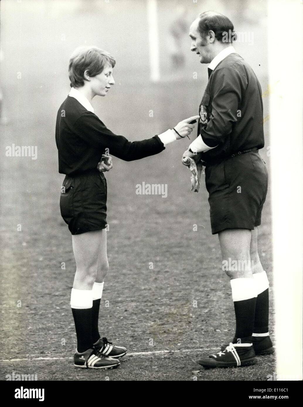 Feb. 07, 1976 - First Woman Referee In An All Male Match: Jennifer Bleley today made soccer history when she became the first woman to officiate at a men's soccer match, Jennifer, 24 year old mother of two refereed a match between Saints Athletic and Croydon Old Boys, at Thorston Heath. Photo shows Jennifer confers with her Einesman Reg Clark before todays game. Stock Photo