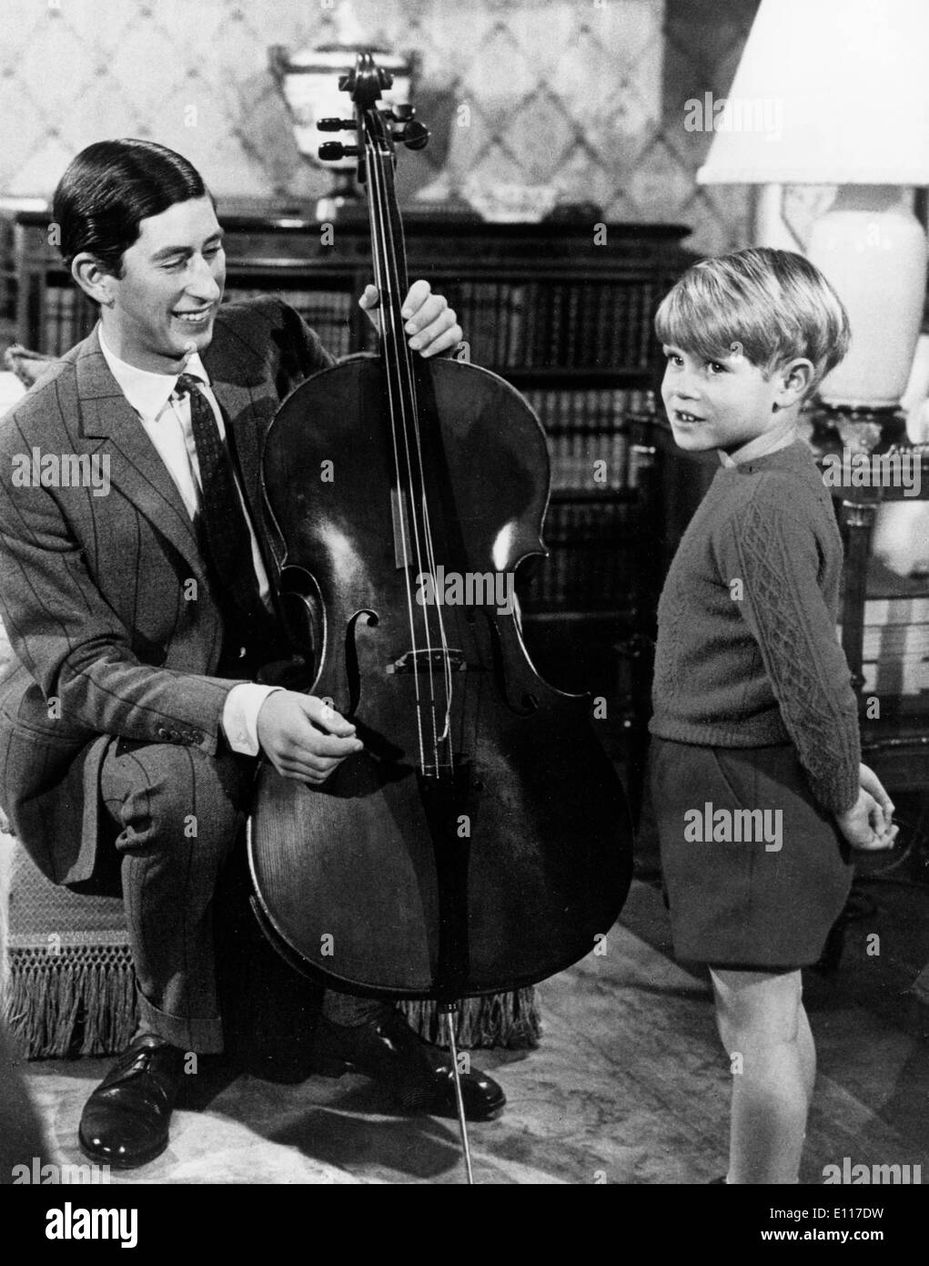 Prince Charles plays cello for Prince Edward Stock Photo