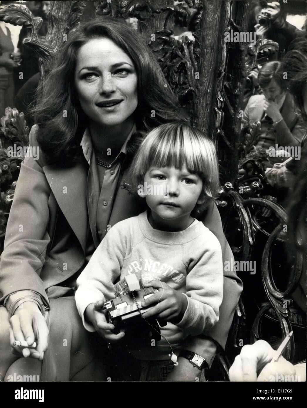 Mar. 08, 1976 - Charlotte Rampling Is Quitting Films For A Year To Have A Baby Actress Charlotte Rampling returned to London - and immediately announced a year off from filming. 30-year-old Charlotte, whose latest picture ''Farewell My Lovely'' is another box office success, already has a 3-year-old son Barnaby, but says Charlotte ''I don't like the idea of an only child, I want a bigger family''. Her husband Bryan Southcombe, who is also her business adviser, agrees. Photo Shows:- Actress Charlotte Rampling and her 3-year-old son, Barnaby, pictured at the Dorchester Hotel in London. Stock Photo