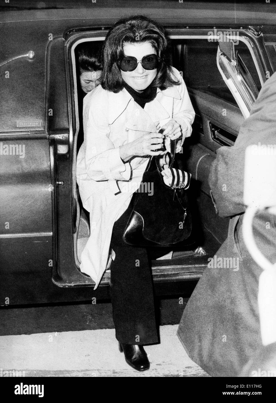 First Lady Jackie Kennedy Onassis getting out of car Stock Photo Alamy