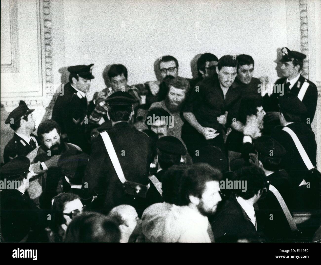 May 05, 1976 - A big confusion happened at the Court in Turin that Judges a group of extra leftist named ''the Red Brigades''. II men accused for a serie of kidnappes, as Mario Sossi, magistrate in Genoa and the businessman Vitterino Ganciam AT the begin of the second audience the public sang ''red flag' and the Judge ordered the removal of the hall. And happened the confusion. Photo shows the group of the accused with the Chef Renato Curcio (with board on left) Stock Photo