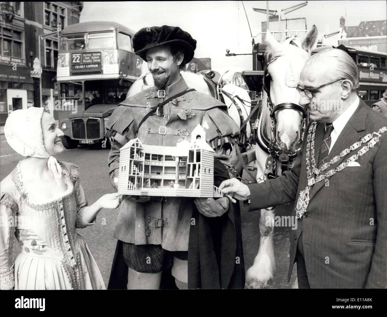 Sep. 30, 1976 - A MODEL OF BRITAIN'S FIRST THEATRE HANDED OVER TO THE MAYOR OF SOUTHWARK. PHOTO SHOWS: BARBARA DARCY and KENNETH BARRON, of the World Centre for Shakespeare Studies, receiving a model of Britain's first theatre, the original Elizabethan Globe, from Councillor GEORGE SILVER, Mayor of Hackney, before it was taken by horses drawn dray to the Globe Playhouse on London's Bankside yesterday. The model, which was been displayed at Hackney Festival exhibition, was later handed by Councillor SILVER to the Mayor of Southwark. Stock Photo