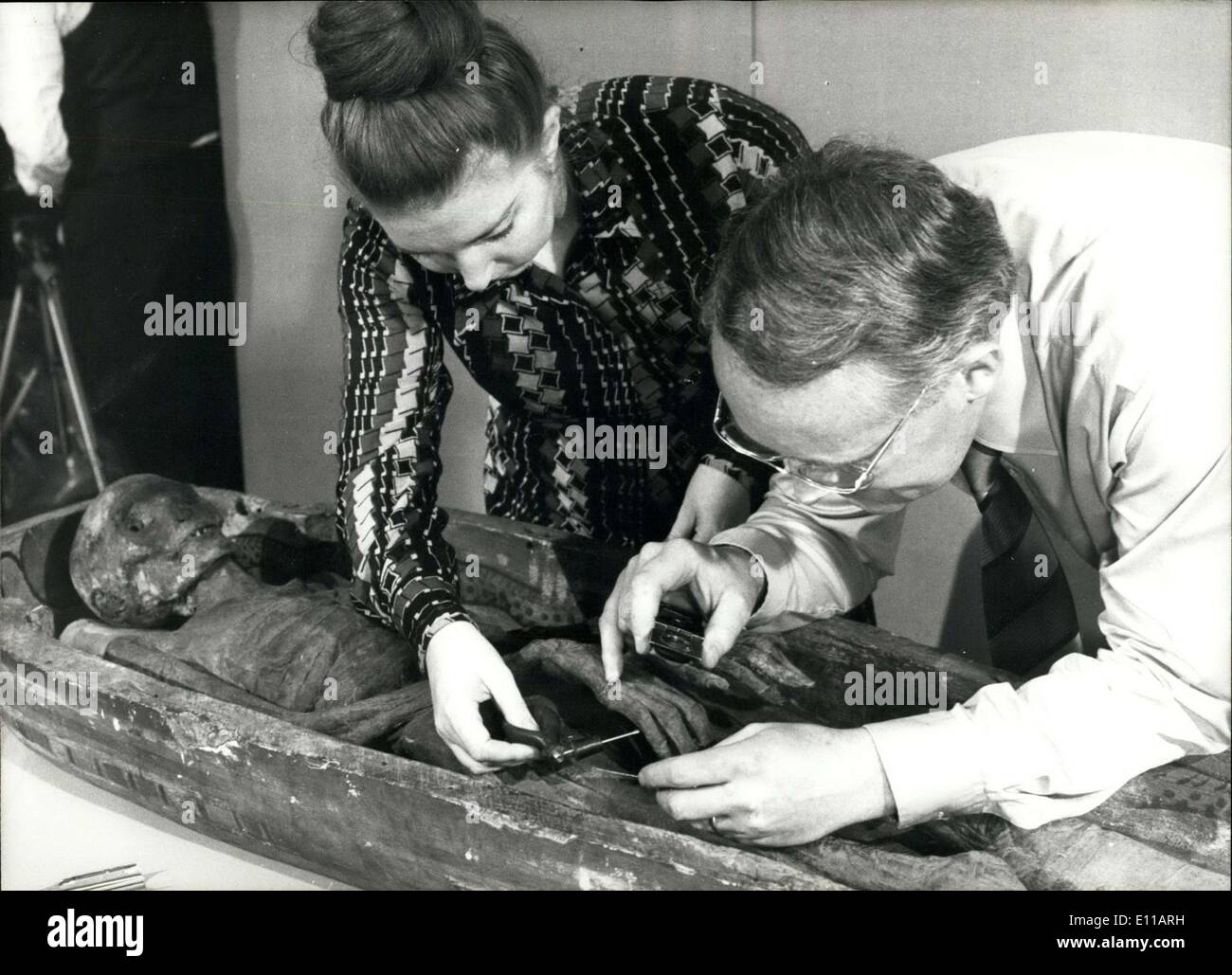 Jun. 21, 1976 - Toe prints help Manchester Police to solve the Riddle of ASRU-The Egyptian Mummy: a 2,600-year-old Egyptian mummy was helping police with their inquiries. Detectives took their finger printing equipment to Manchester University to aid Doctor Rosalie David, and Egyptologist, to discover more about the life and times of ASRU, a tiny, thin woman the ought to have been a dancer in the Egyptian 25th dynasty. But the team of finger print experts, led by Chief Inspector, Tony Fletcher, feel sure of one thing - ASRU was never a dancer Stock Photo