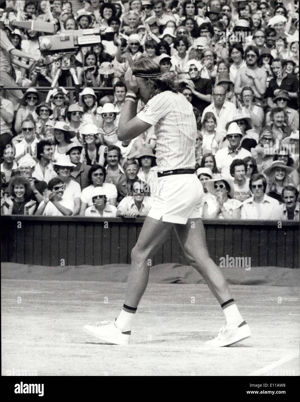 Jul. 03, 1976 - Bjorn Borg Of Sweden Is The 1976 Wimbledon Singles Champion: This afternoon on the centre court, at Wimbledon Bjorn of Sweden won the Men's Singles title when beating L Nastase of Rumania 6-4 6-2 9-7. Photo shows Bjorn Borg holds his head after winning the men's singles title at Wimbledon today. Stock Photo