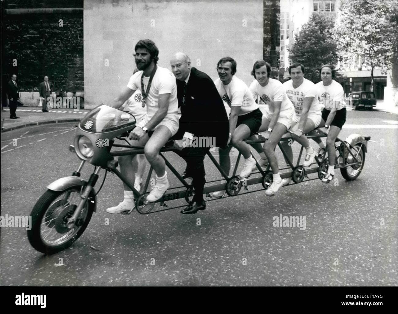 Jul. 07, 1976 - The Lord Mayor of London takes a ride on a bicycle made for six; Photo Shows The Lord Mayor of London, Sir Lindsay Ring, joining members of the Goodmayes round Table on their 18 feet bicycle made for six outside the Mansion house yesterday, the cyclist are supporting the International help for children fund, of which the Lord mayor is president, and on August 20 they will set out on a 480 mile sponsored trip to Hamburg. Stock Photo