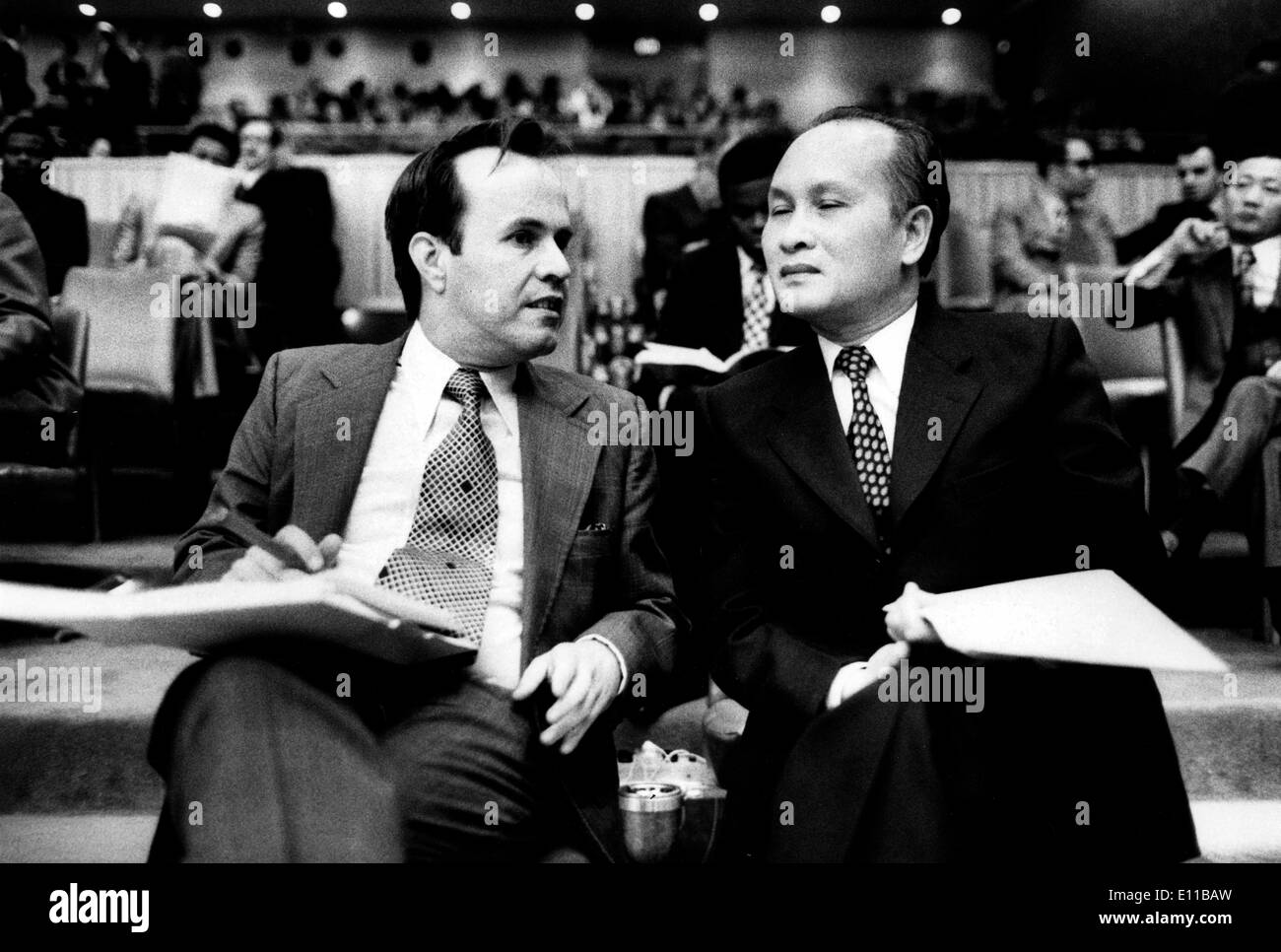 Nov 15, 1976; New York, NY, USA; Cuban Delegate, Ambassador Dr. RICARDO ALARCON DE QUESADA (L) with Vietnam Observer DINH BA THI. Stock Photo