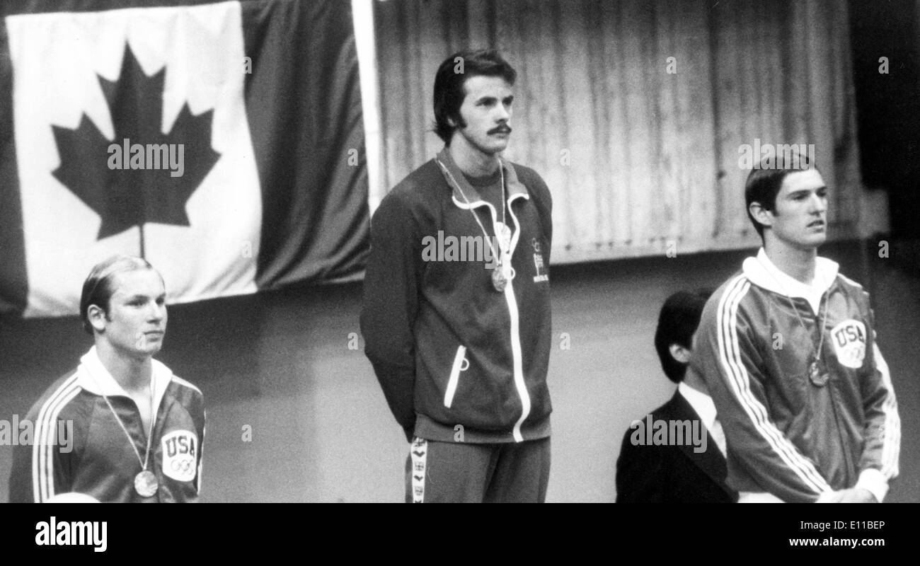Jul 20, 1976; Montreal, Canada; British swimmer DAVID WILKIE wins Gold in the 200 meter Breast stroke. Pictured LtoR Colella o Stock Photo