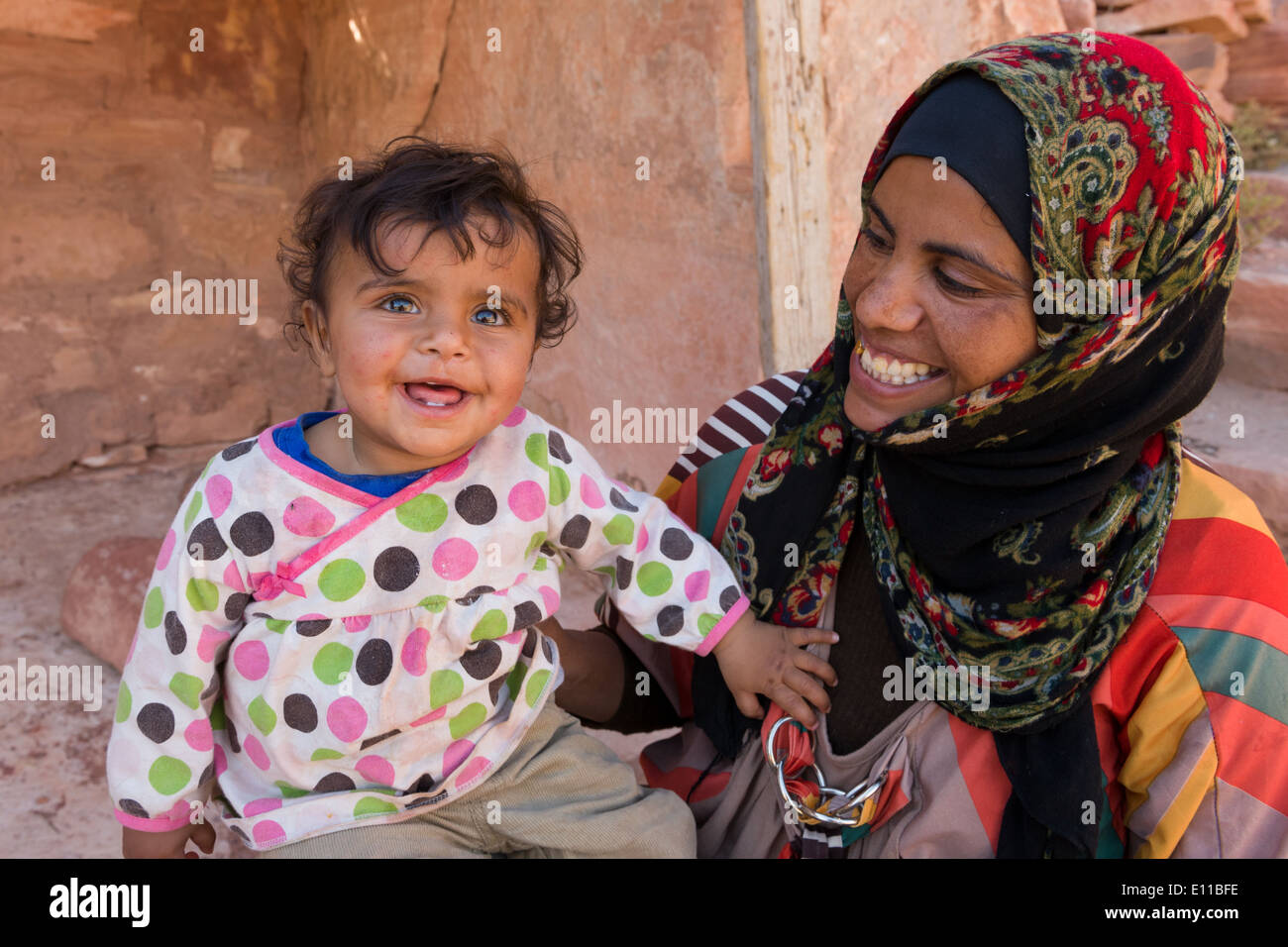 Bedouin woman and her young daughter at the High Place of Sacrifice, Petra, Jordan Stock Photo