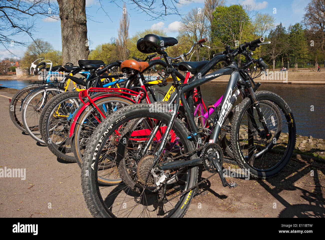 Bikes bicycles Bike bicycle parked in a cycle rack near the city centre and River Ouse York North Yorkshire England UK United Kingdom GB Great Britain Stock Photo