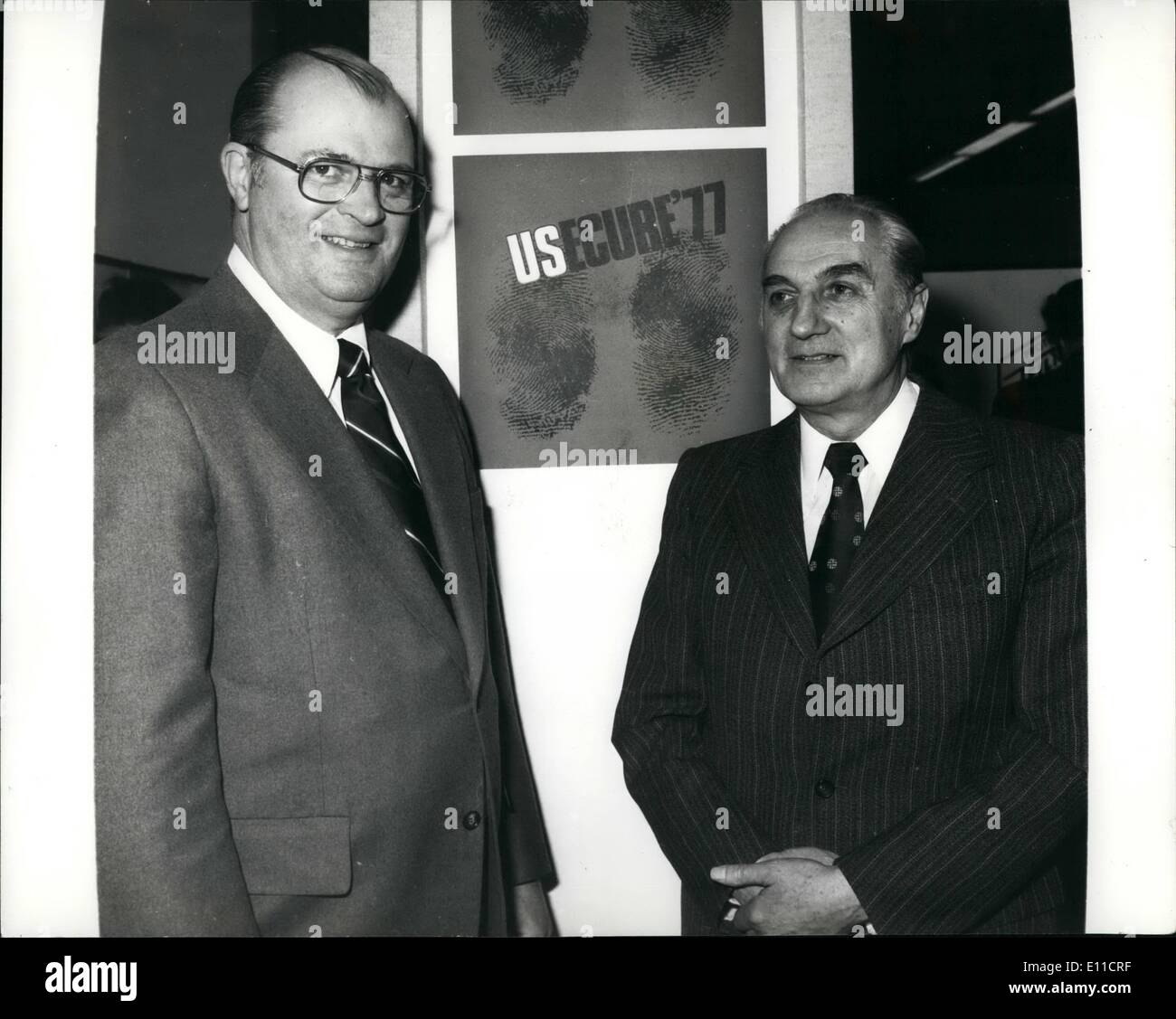 Mar. 03, 1977 - Usecure' 77: An exhibition of Industrial and Commercial Security equipment is now on show at the United States and Trade Center, Langham Place in London. Photo shows pictured at the exhibition are left, Mr. Jay Cockrane Asst Director of the F.B.I. and Mr. Jean Nepote Secretary General of Interpol Stock Photo