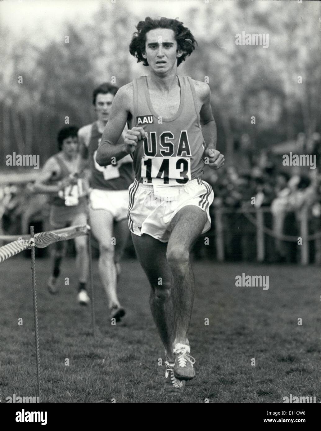 Mar. 03, 1977 - The I.A.A.F. cross country championships at Dusseldorf west Germany ; over the weekend the I.A.A.A.F cross country championship took place at Dusseldorf west Germany, with all the top European countries taking part. photo shows Thomas hunt of America no 143 seen winning the junior event of the cross country. Stock Photo