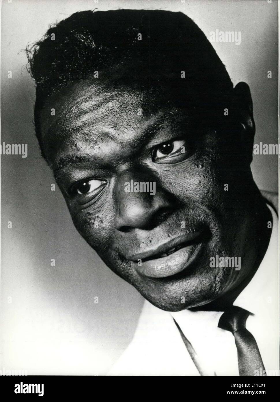 Mar. 17, 1977 - March 17, 1977: 60 Birthday of Nat ''King'' Cole: Nat ''king'' Cole (his proper name was Nathaniel Adams Coles), the famous black jazz-musician, pianist and singer, was born 60 year ago, on March 17, 1917 in Montgomery/Albama. Singing in a church choir was his only musical training, and playing the piano he learned by watching the pianist of a little jazz-band in hi hometown. His debut he made with a little band in Chicago. From 1937 to 1948 he played in his own trio Stock Photo