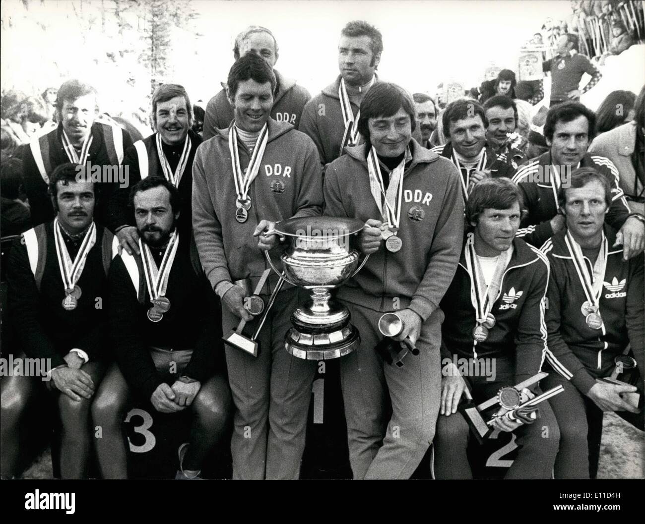 Feb. 02, 1977 - Gold, silver and bronze for bob champions: World championship in four men bob. Picture shows medal winners, on left 3rd placed west Germans with Resch, Berg, Ohlwarter and Barfuss, center Eastern Germany, winners with Nehmer, Gerhardt, Germeshausen and Bethge, at right and 2nd placed Swiss team with Schaerer, Bachli, Marti and Benz. Stock Photo