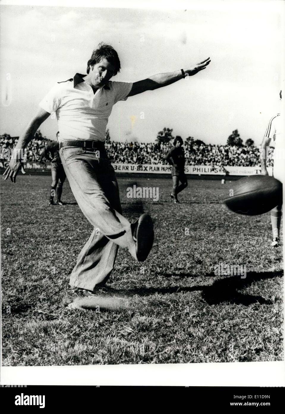 Apr. 19, 1977 - Jeff Thompson is fit to tour England this summer: Jeff Thompson, the Australian fast bowler who injured a shoulder during a test match against Pakistan past a fitness test, and will now be in the team to tour England this summer. Photo shows Jeff Thompson kicks off for a Rugby league match in Melbourne. Stock Photo